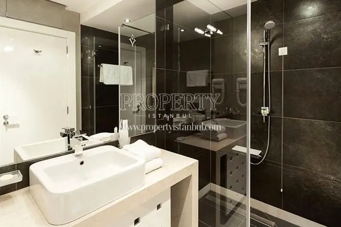Small black and white bathroom in EMS 211 Park