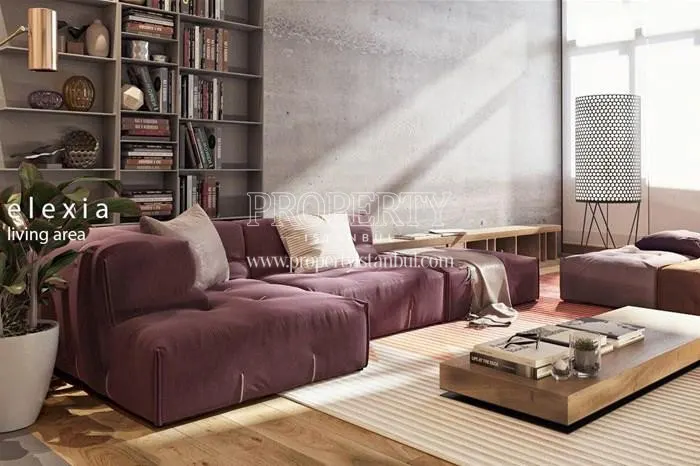 The living room with claret red sofas in Elexia Levent