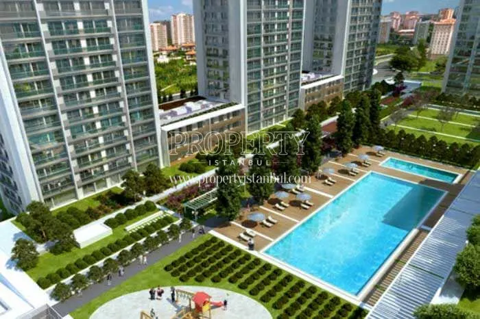 The outdoor swimming pool of the Elite City compound
