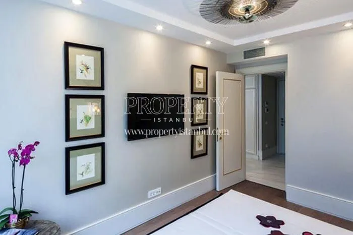 TV on the living room door in Elysium Art Sisli