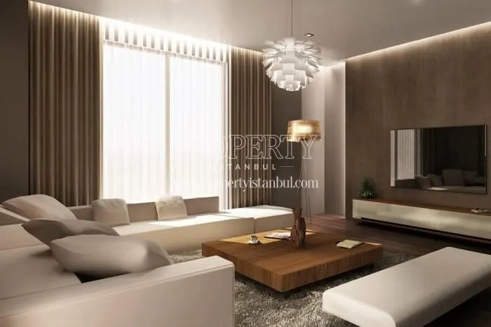 Spacious living room with a white corner sofa in Emin Evim 5Yuz60