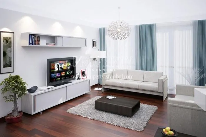 White lounge suite in the small living room in Erka Konsept