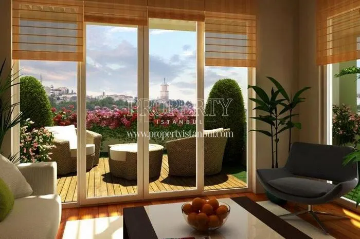 The living room with a balcony in Essenora