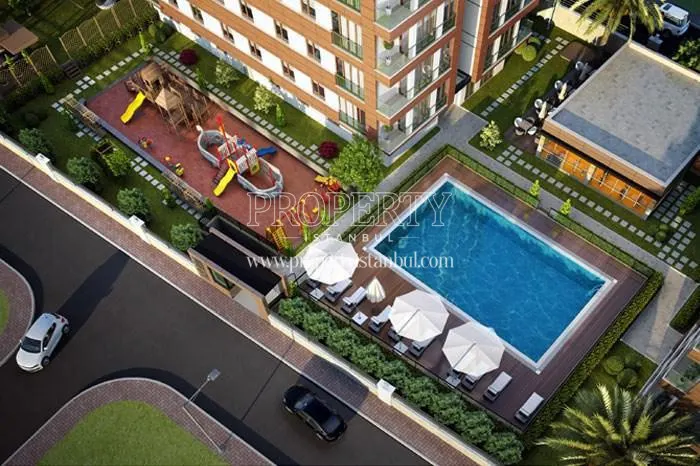 Playground and outdoor swimming pool view from above