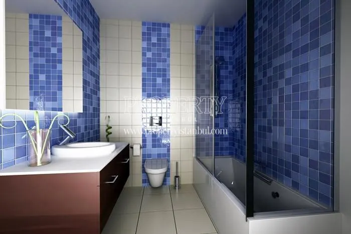 The bathroom with white and blue tiles in Eurotolia Panorama Evleri
