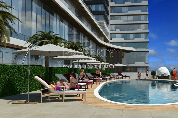 Evim Kadikoy residents swimming in the compound pool