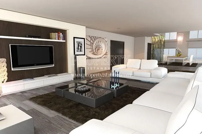 Spacious living room with a white lounge suite in Evim Kadikoy