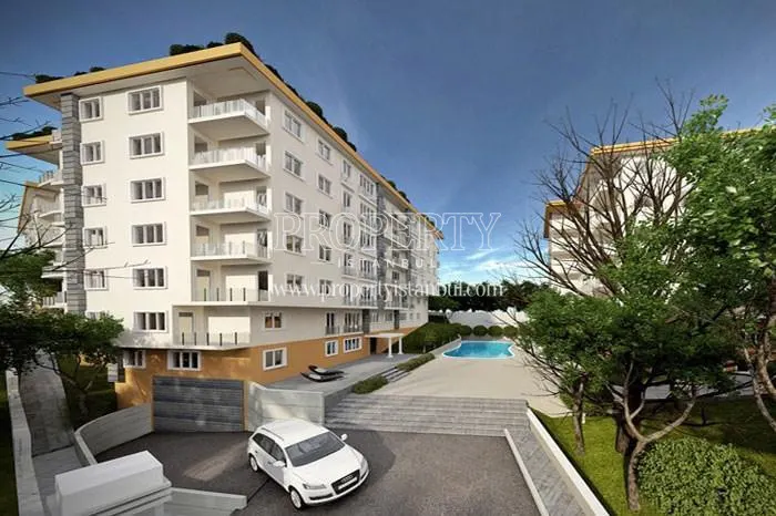Garage exit and outdoor swimming pool in Finia Pasapark