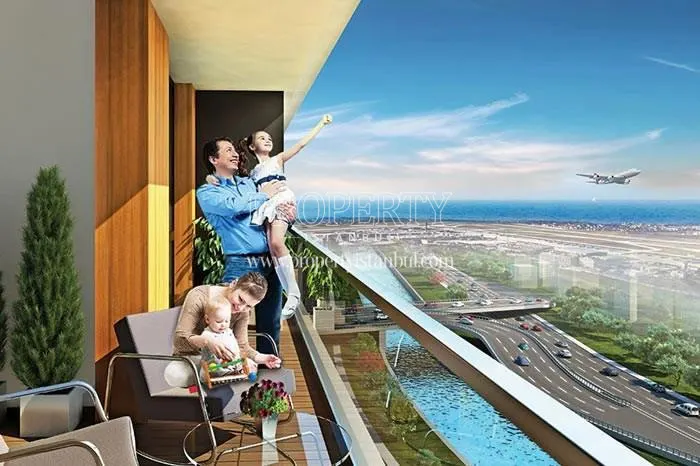 Happy family enjoying themselves on the balcony in Fortis Istanbul