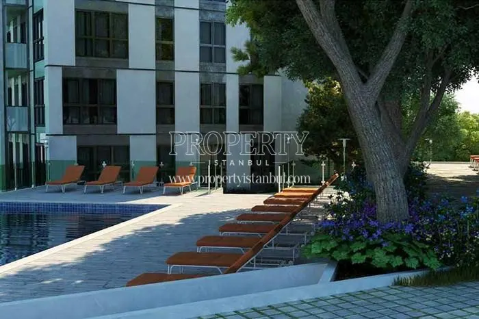 The orange loungers near the swimming pool in the Fullada Maltepe compound