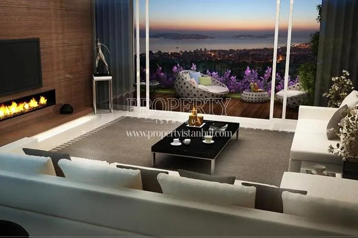 White lounge suites in the living room with a small balcony in Gokdeniz Kartal