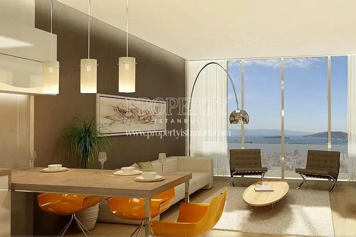 The living room with high windows in Gokdeniz Kartal