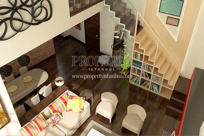 The view of the living room of the duplex unit from above in Gokdeniz Kartal