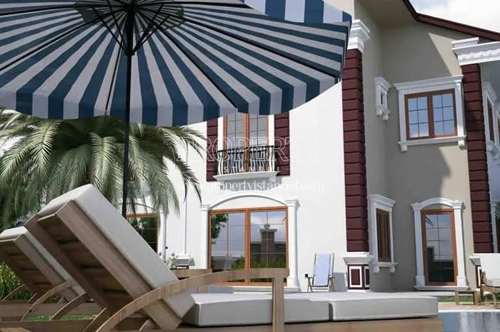 Sunbeds in front of the luxury villa in Gravur Zekeriyakoy Villalari