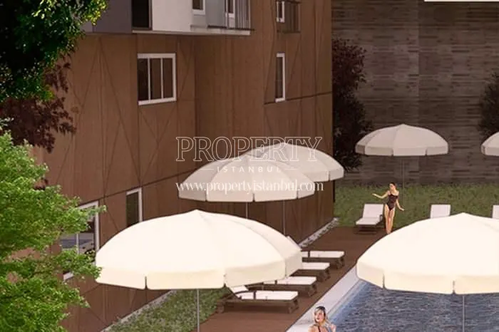 The residents enjoying the compound swimming pool in Green Pine Maslak Residence
