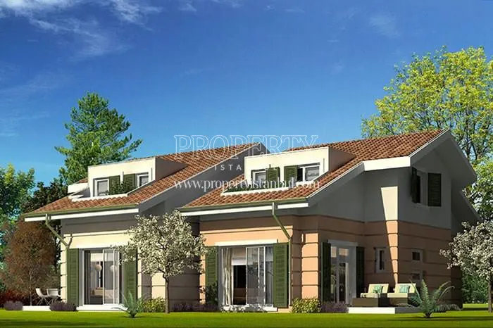Front side of pink villa in Gulnar Koru Evleri