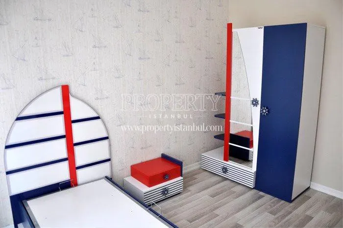 Blue and white furnished bedroom for kids in Gumus Park
