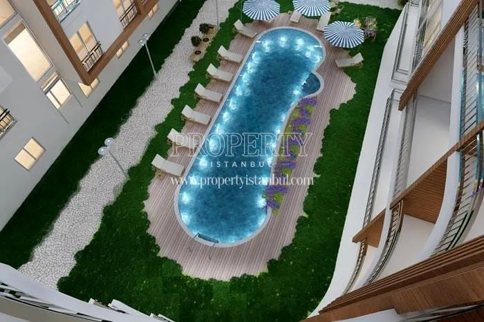 The view of the swimming pool from above in Guverte Evleri