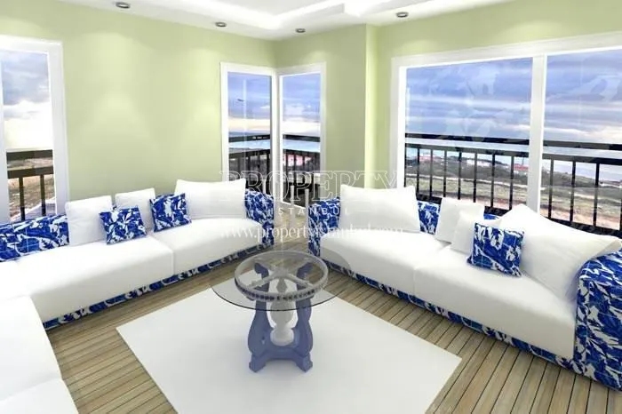 White and blue sofas in one of the Guverte Evleri apartments
