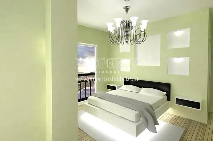 Light green and white master bedroom in Guverte Evleri