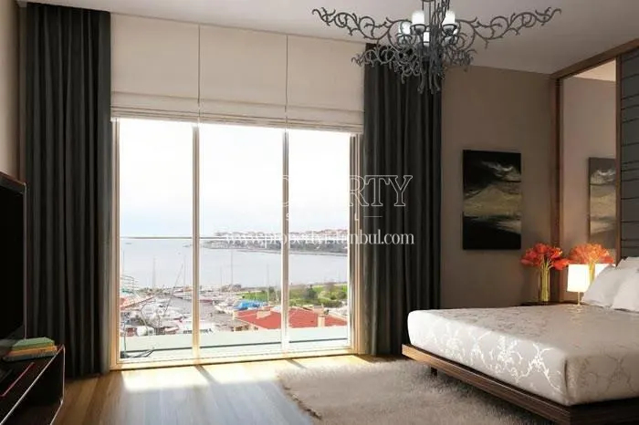 The master bedroom with a sea view in Guzel Residence