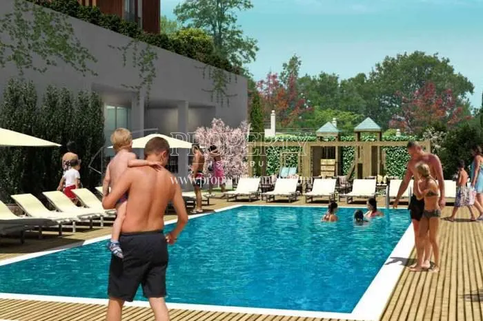 Hobi Life residents swimming in the compound pool