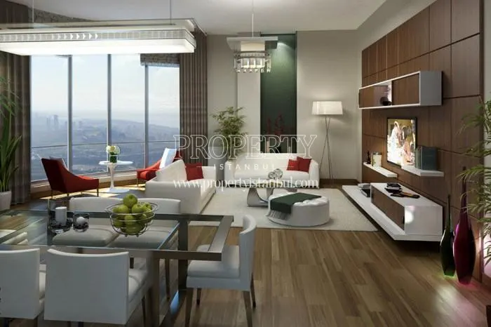 White sofa suite with red pillow in the living room in Huzzak Tower Metro