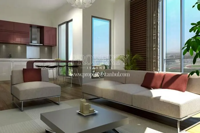 The open kitchen with a balcony in Huzzak Tower Plus