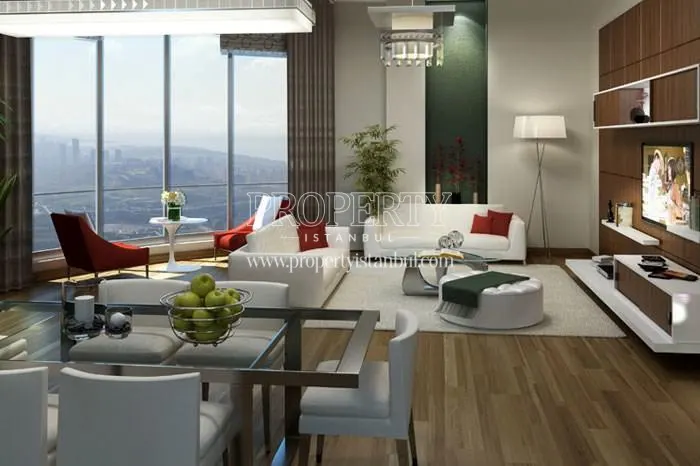 The living room with the city view in Huzzak Tower Plus