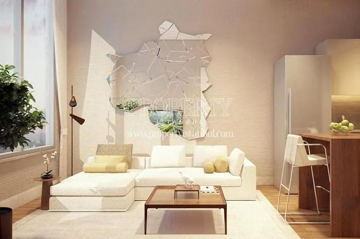 Small living room with a white corner sofa in Inistanbul Hayat