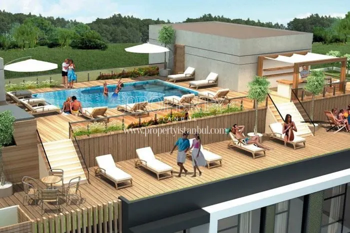 Outdoor swimming pool on Isis Residence top floor