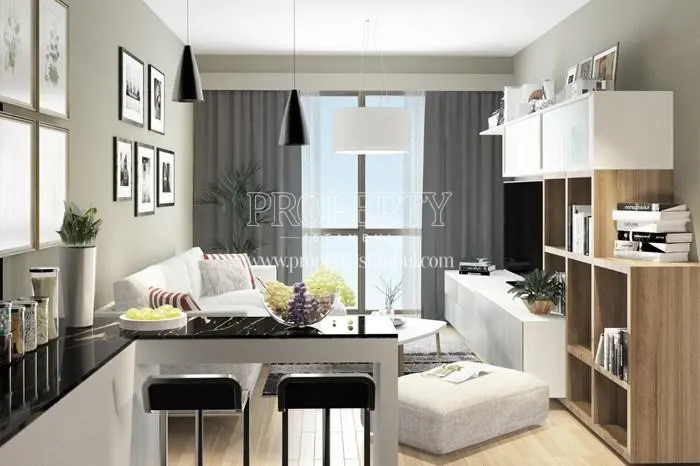 The living room with a white sofa in Iva Flats Kagithane