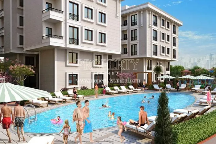 The residents of Kasr-i Istanbul swimming in the pool
