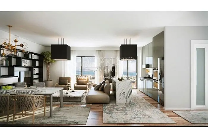 Spacious living room with open kitchen in Kayim Rezidans