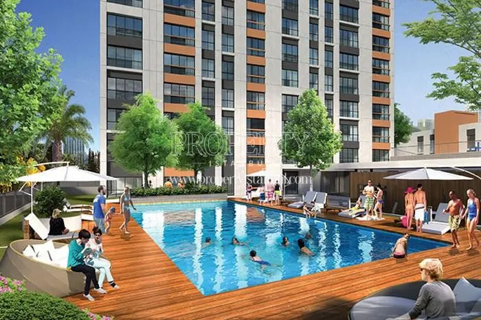 Kayim Rezidans residents swimming in the compound pool