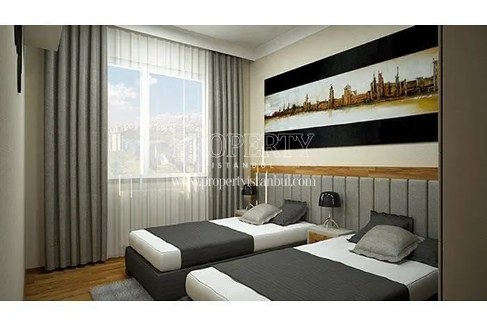 Two single beds in one of the bedrooms in Kent Kagithane