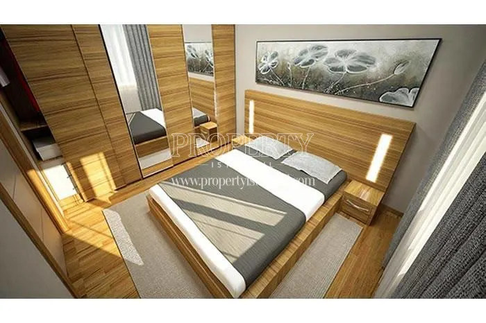 Master bedroom with wooden furniture in Kent Kagithane