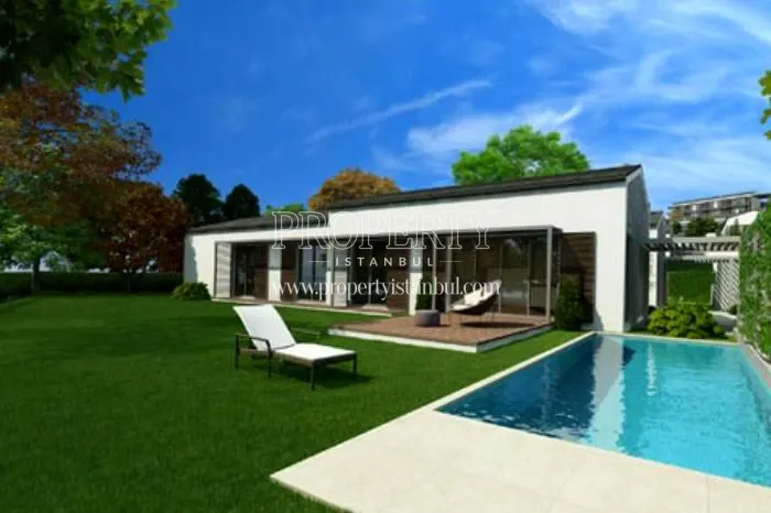 The private garden and swimming pool for one of the villas in Kent Optimum Zekeriyakoy