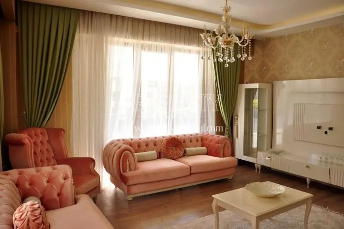 The pink sofas in one of the living rooms in Kilic Kent