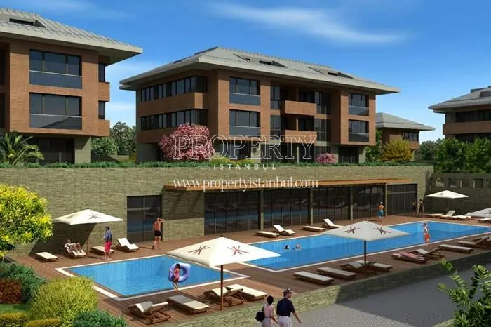 Outdoor swimming pool in the Kirkkonak Tarabya compound
