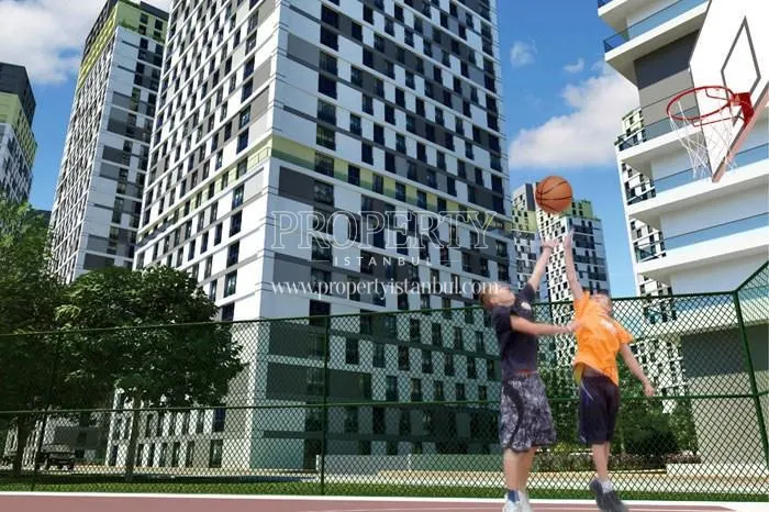 The boys playing basketball in the Kristal Sehir compound