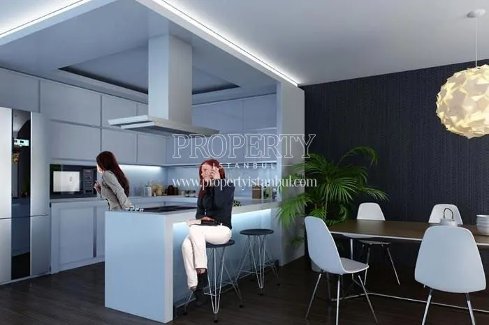 A kitchen with the residents in Levent Life Residence 2