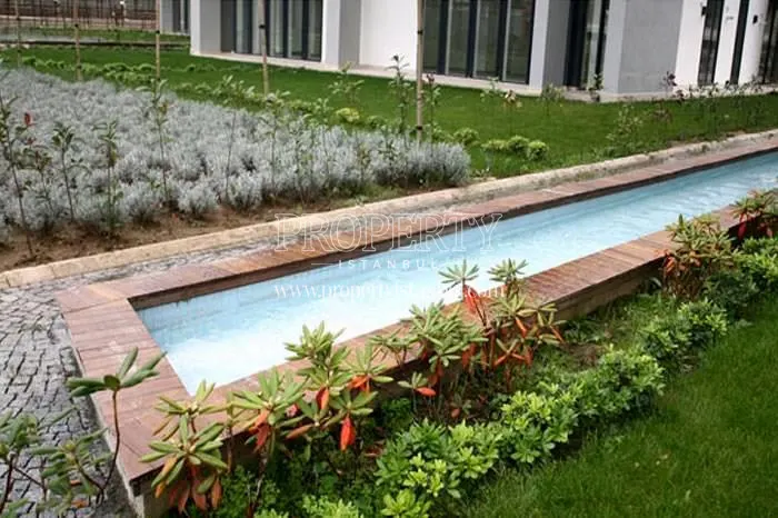 The small water canal in the Lidya Flats garden
