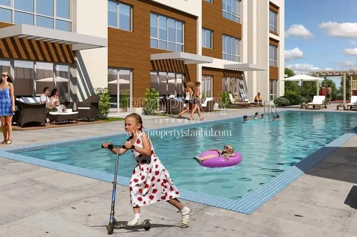 The outdoor swimming pool in the Lokum Evler compound