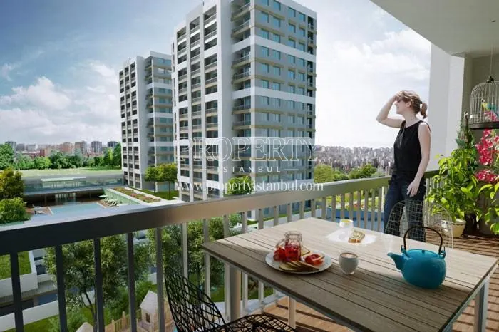 The woman viewing the city from the balcony in Makyol Yasam Beylikduzu