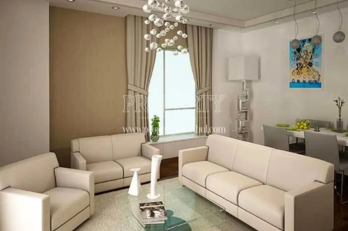 Small living room with a white lounge suite