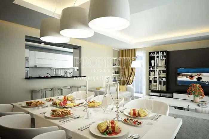 Full plates on the dining table in the living room in Maritza Istinye Evleri