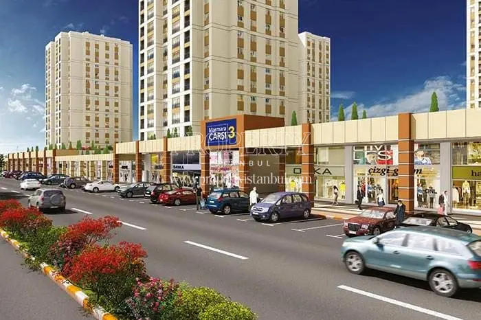 The parking lot in front of the shopping center in one of the blocks of the Marmara Evleri 3 compound
