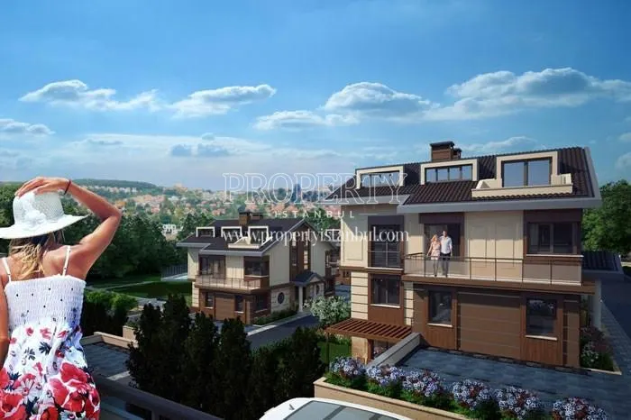The family on their unit balcony in Merkez Zekeriyakoy
