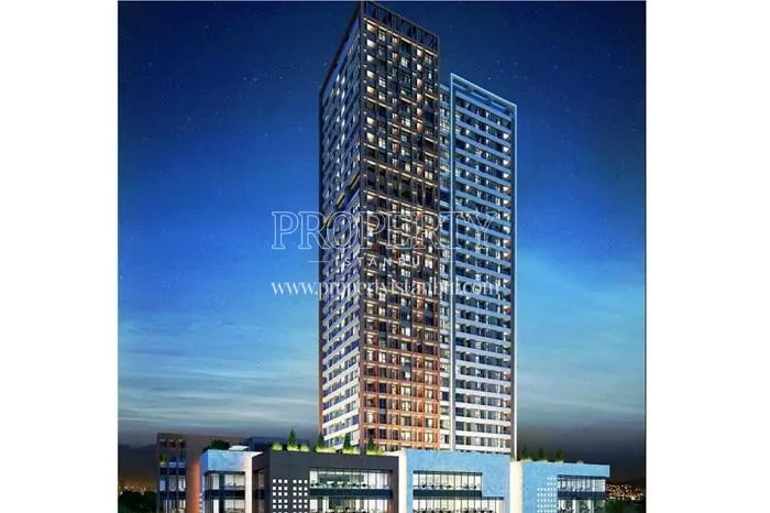 Twin Mesa Koz towers at night